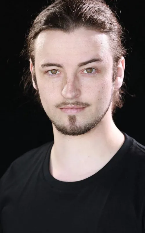 Travis Holian